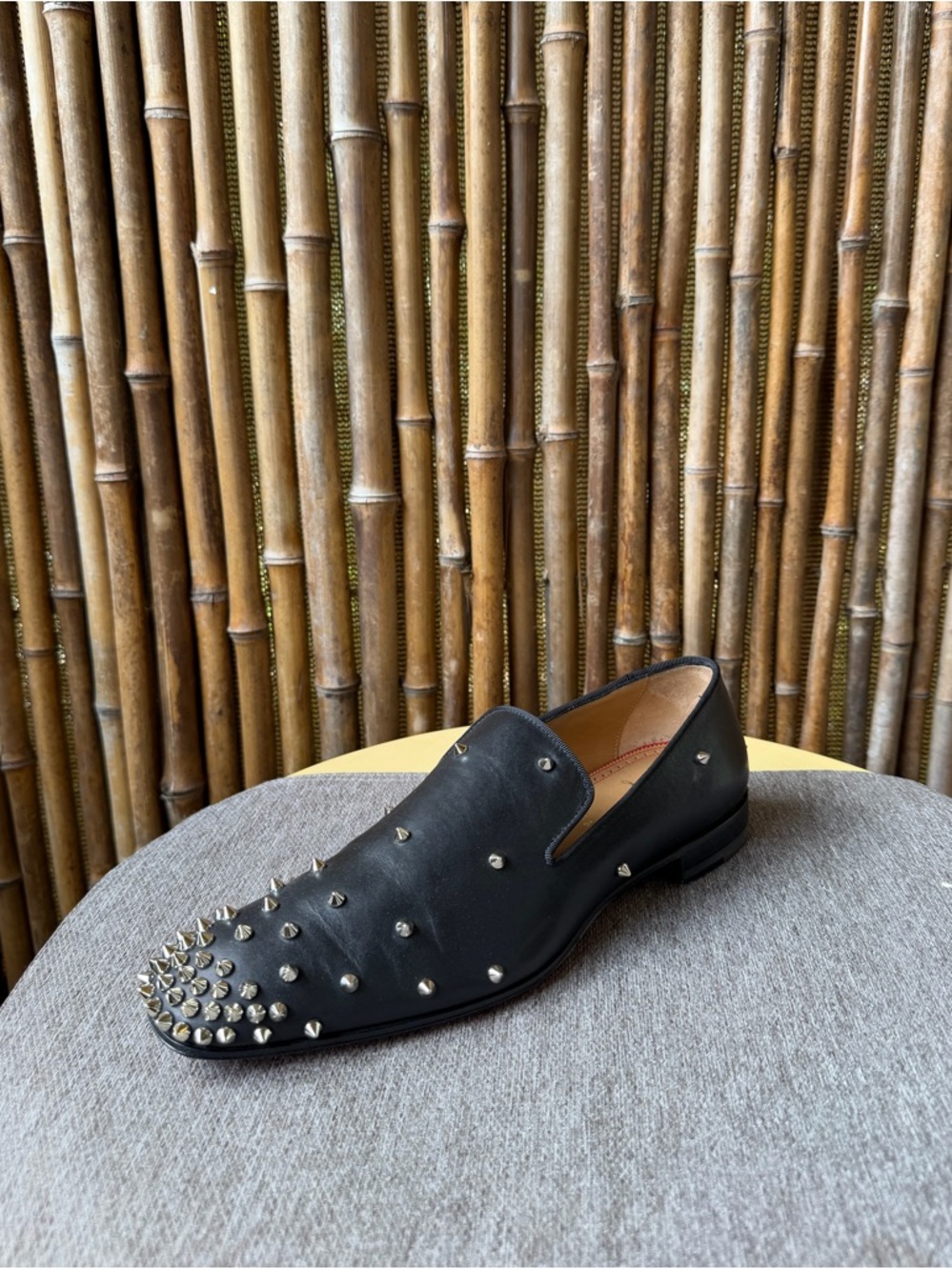CHRISTIAN LOUBOUTIN men’s spiked leather loafers.